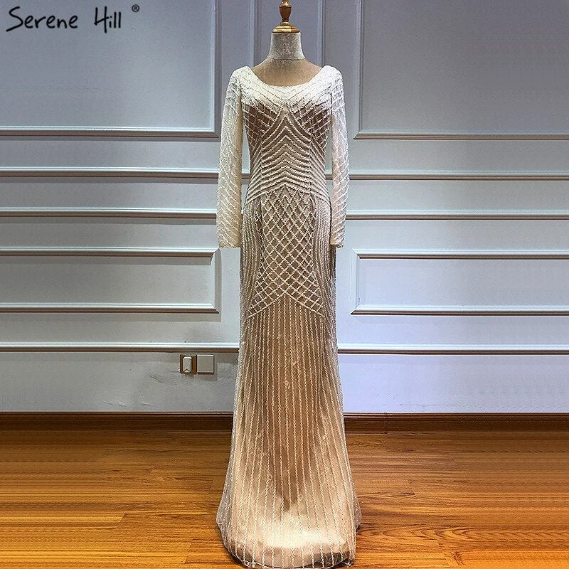 Sleeveless evening dress -On Sale No Return No Refund Sale Dubai White Nude Luxury Long Sleeves Evening Dresses 2024 Latest Design Full Beading Mermaid Formal Dress Serene Hill LA60958